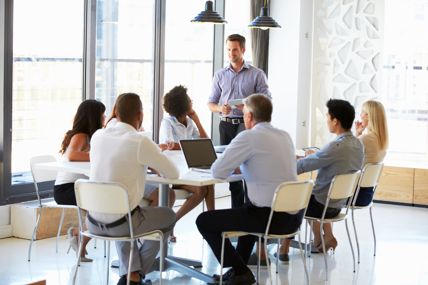 Colleagues at an office meeting